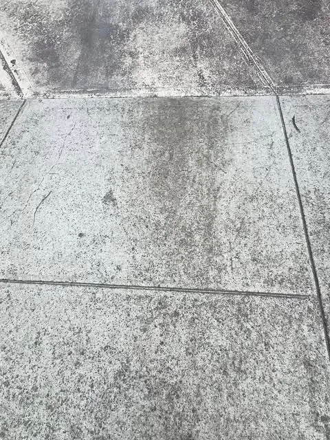 Tired, stained concrete before resurfacing