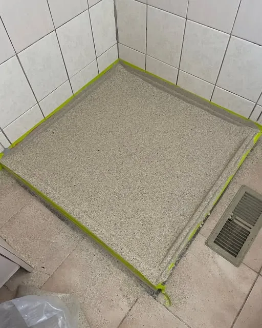 Shower base, recoated
